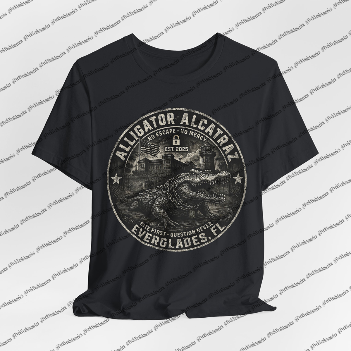 Black t-shirt with alligator graphic and text on a light gray background